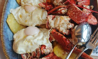 Local food with a twist. Lobster with fried eggs