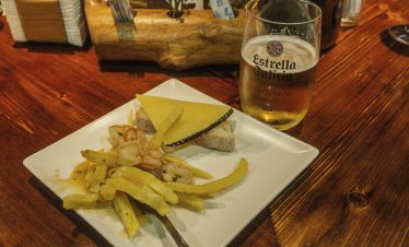 Tapas in a Santiago de Compostela bar with beer
