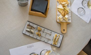 Elegant plated Michelin-starred lunch with wine pairing.